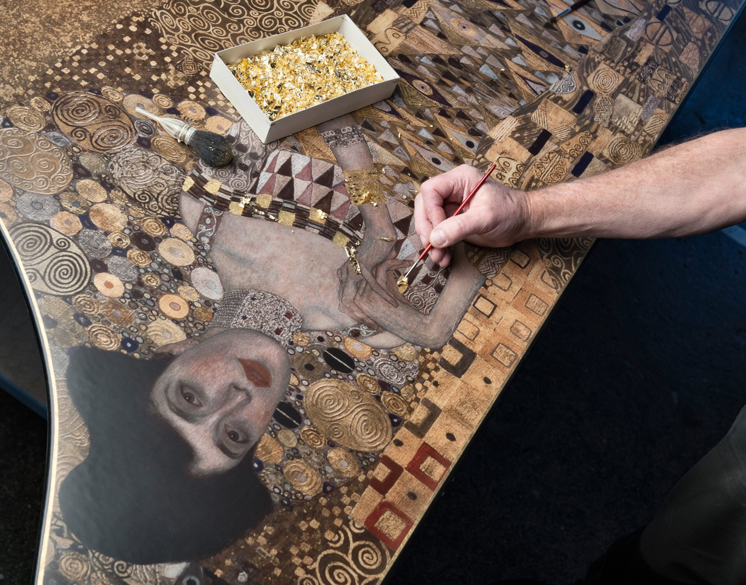 applying gold leaf 2